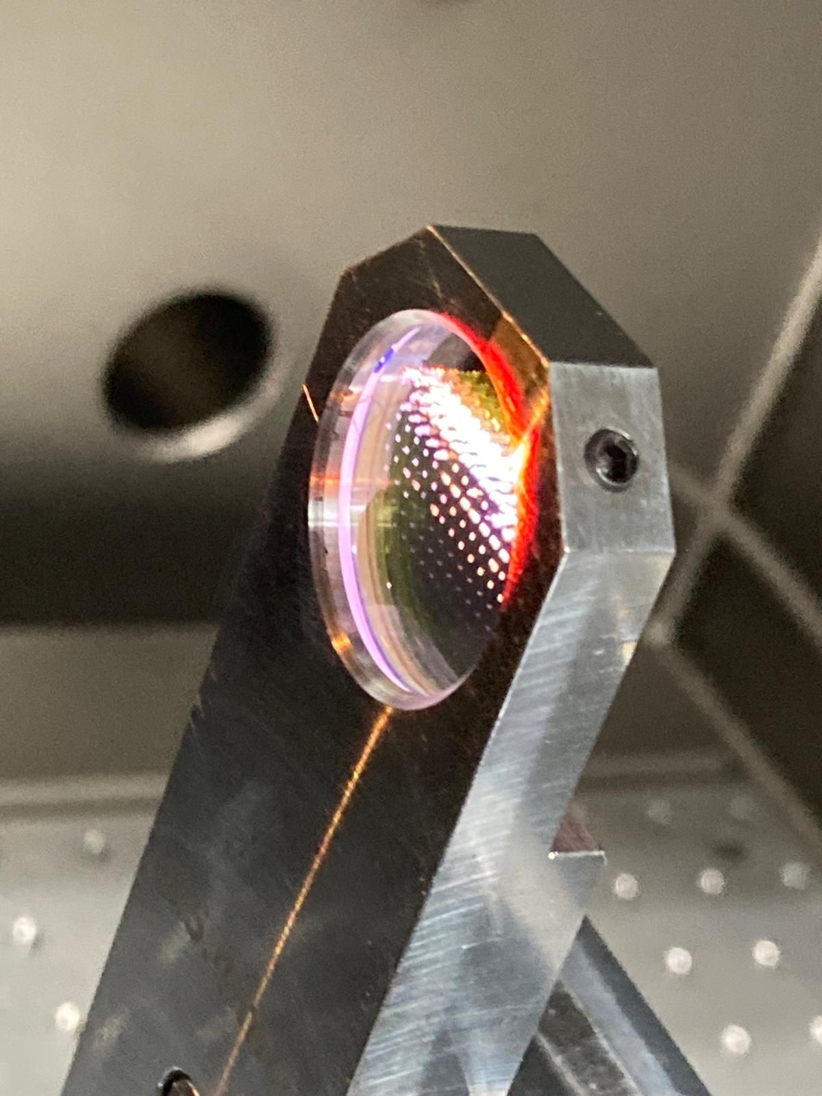 1 inch sample after LIDT test in holder in chamber